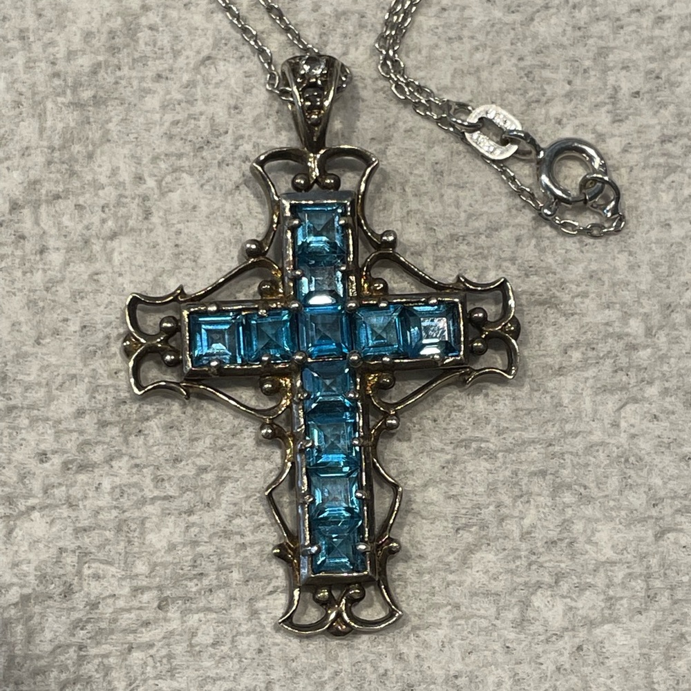 Sterling cross with blue topaz and diamond accent, necklace.